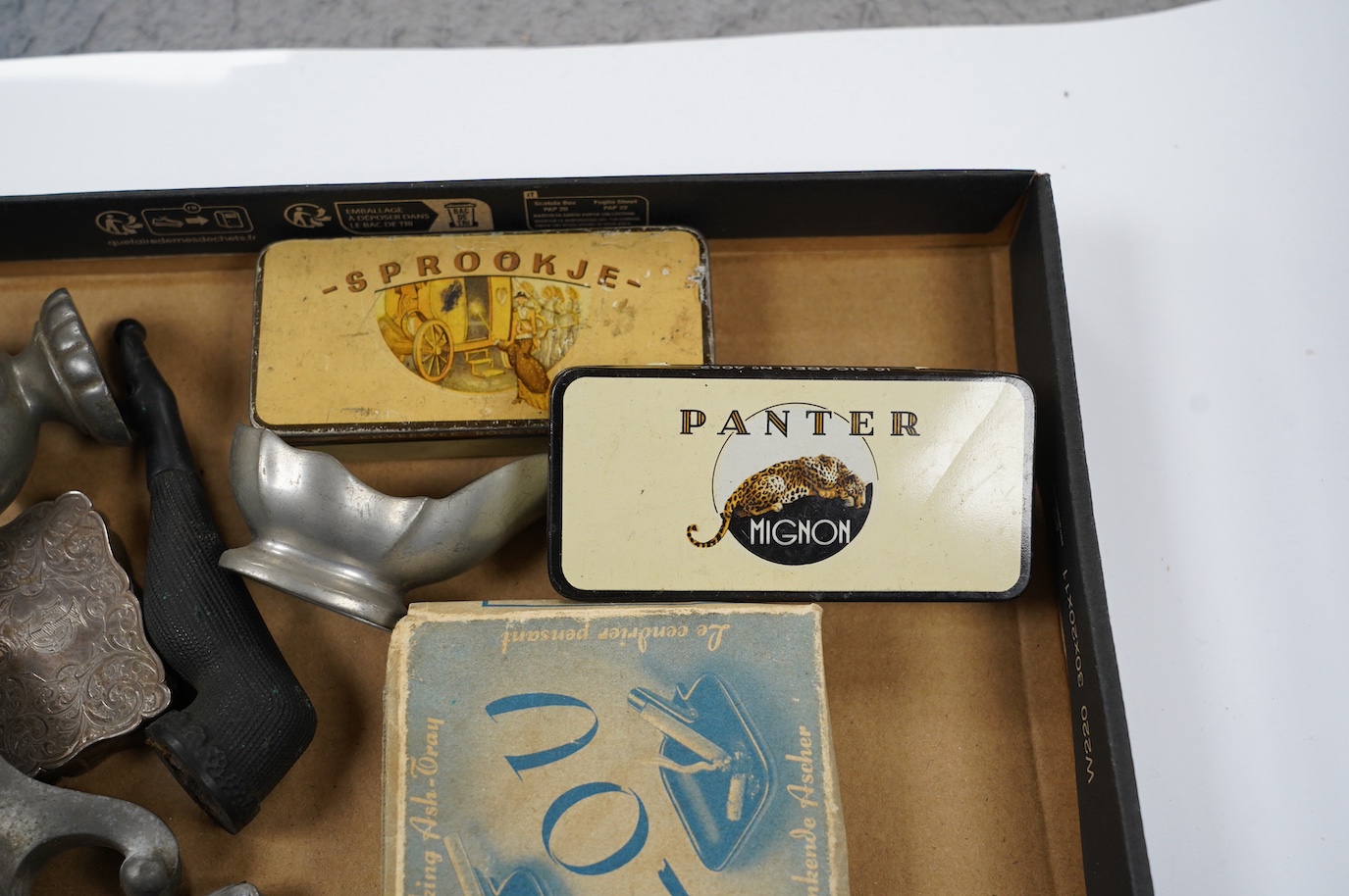 Sundry smoking related curios, including a pipe, pipe stands, match boxes, an ashtray, etc. Condition - fair